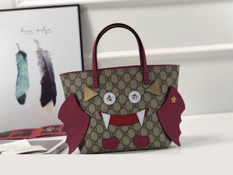 G*u*i shopping bags